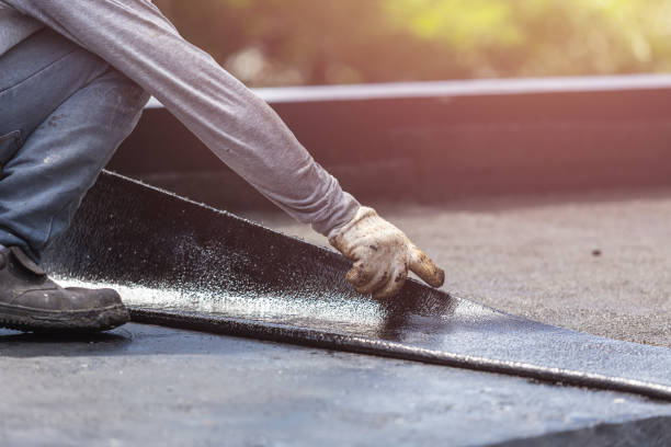 Professional Basement Waterproofing technician working in Saddle River, NJ